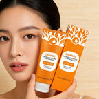 Woman holding the Nourae Orange Enzyme Brightening Exfoliating Gel tube and box