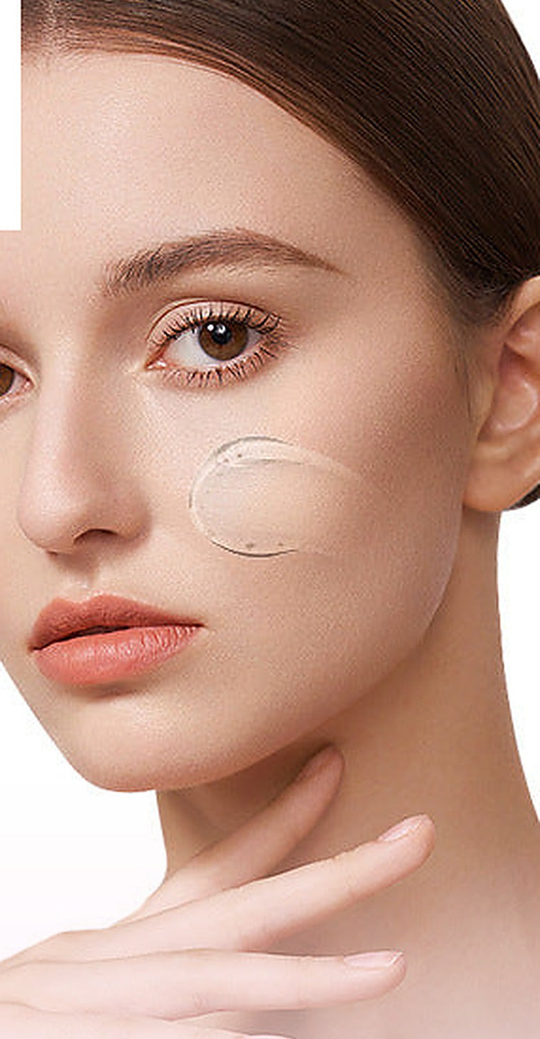 Close-up of smooth, freshly exfoliated skin with a touch of gel on the cheek